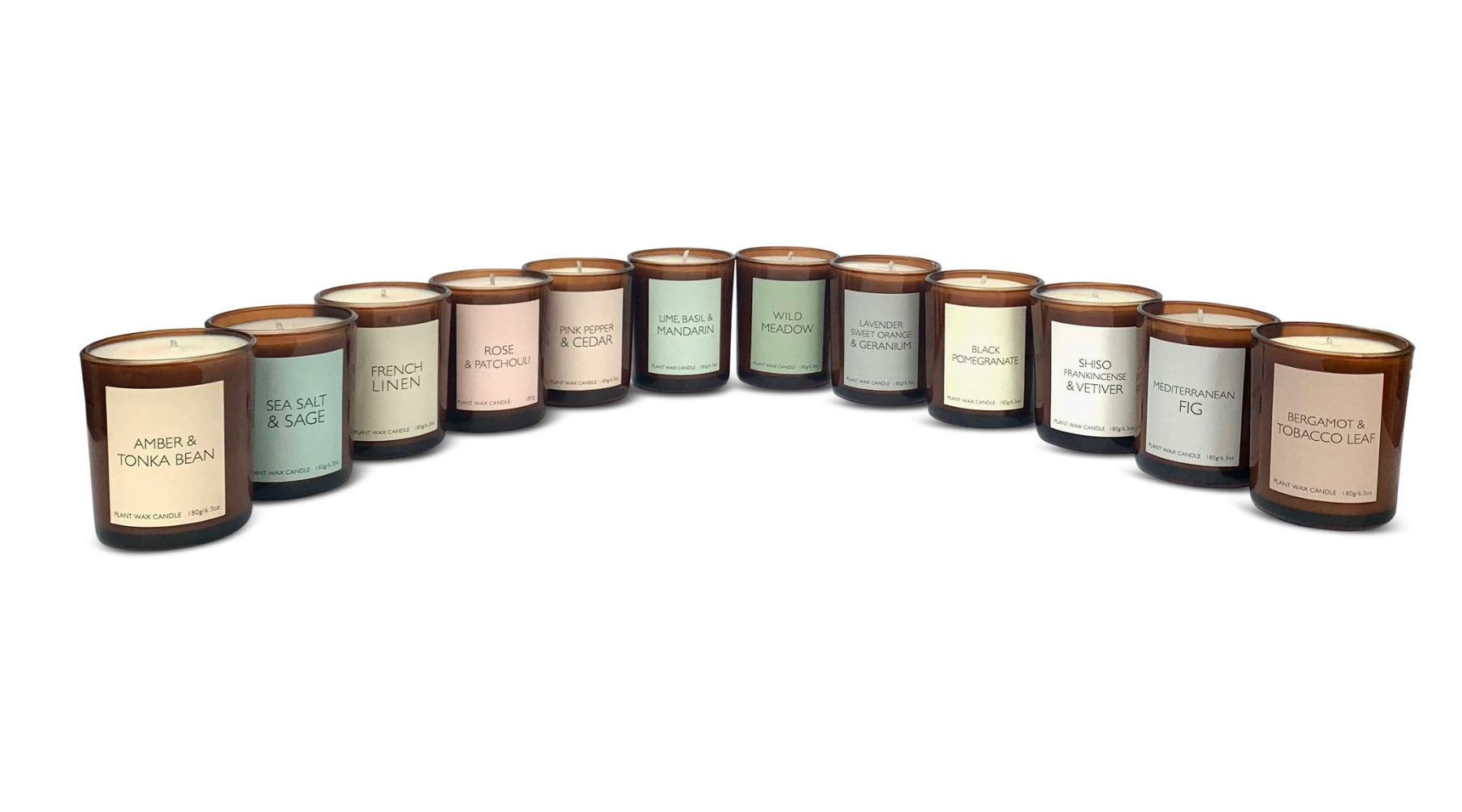 a semi circle of vegan scented candles 