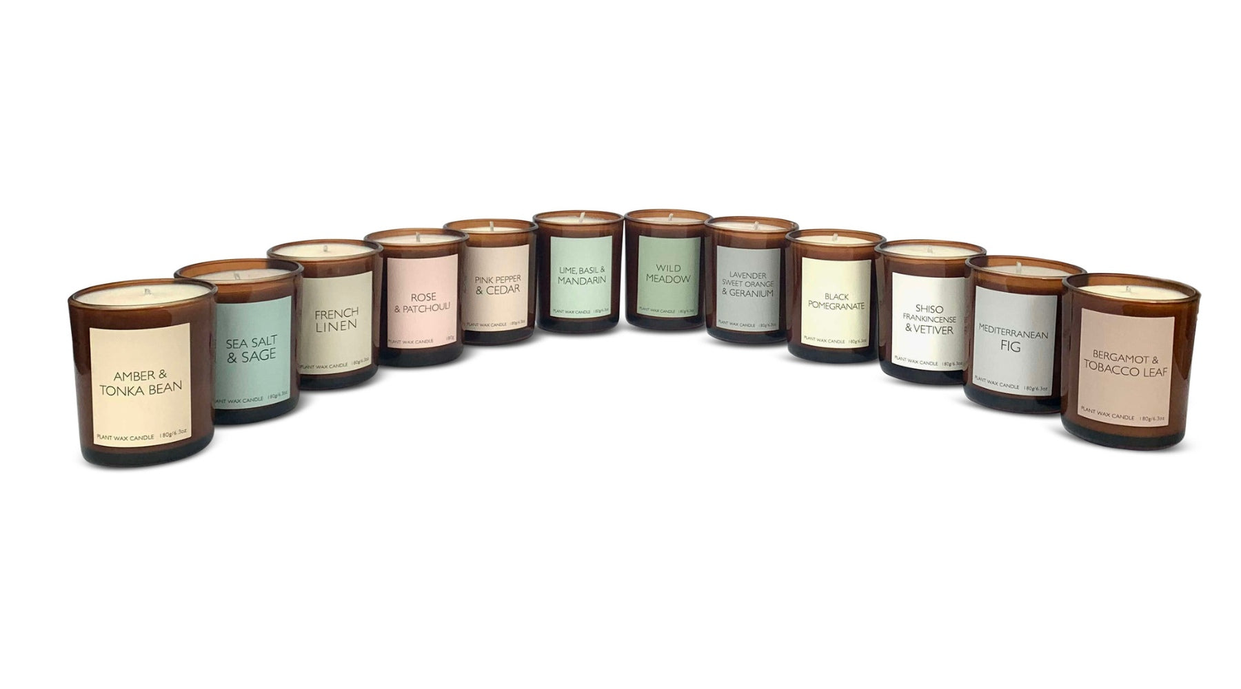 a semi circle of vegan scented candles