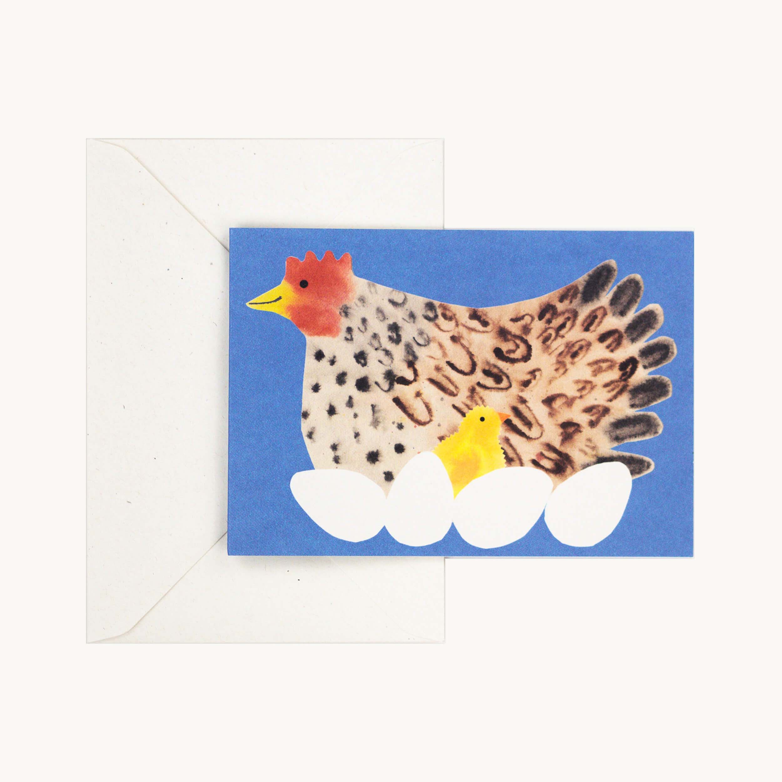 Card with a chicken and chick design on a blue background