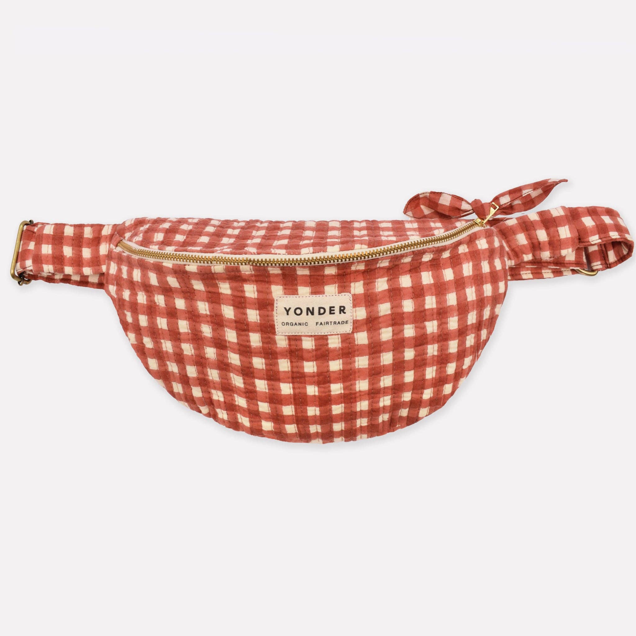 Red and white checkered fanny pack with 'Yonder' branding on a white background