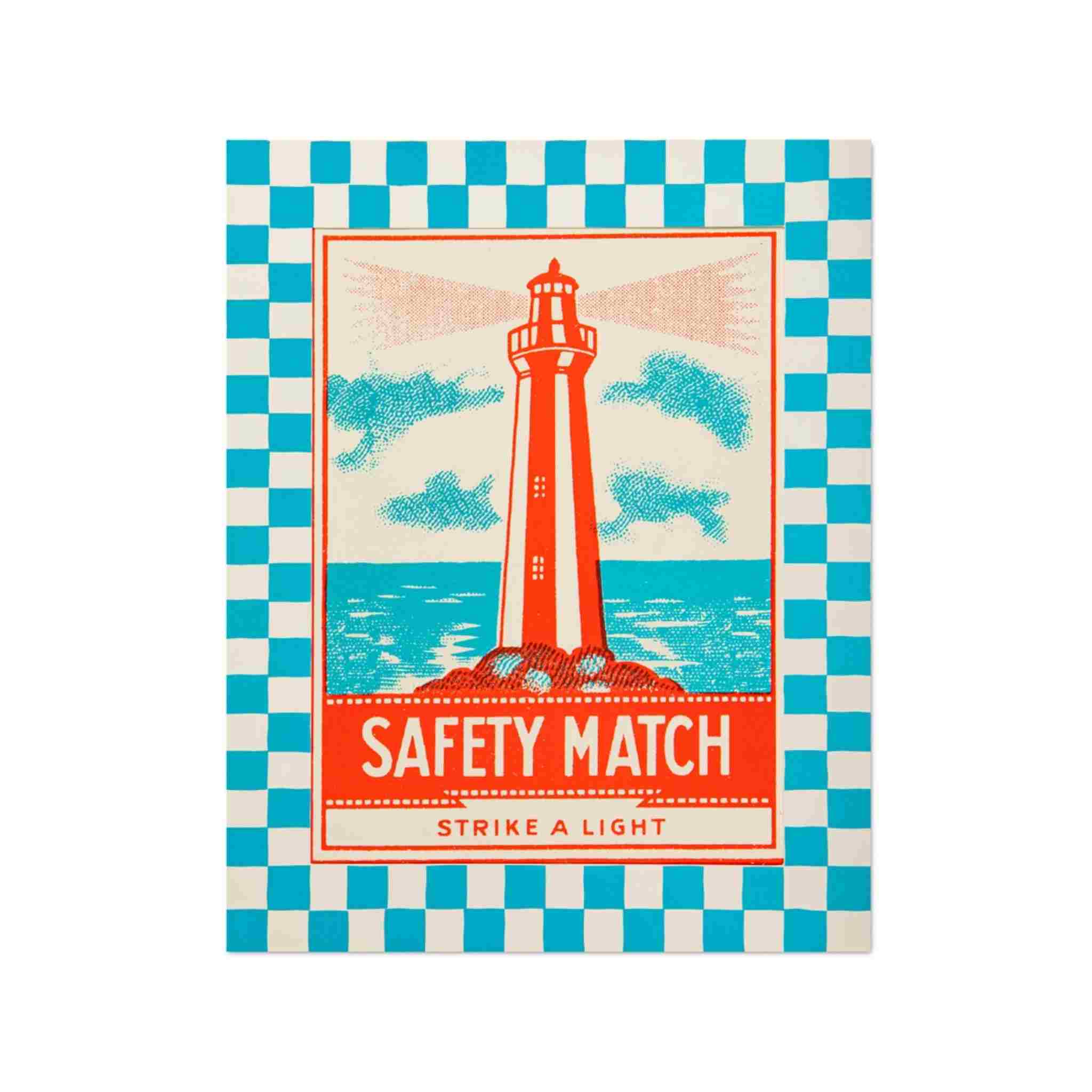 Matchbox with a lighthouse design on a blue and white checkered background