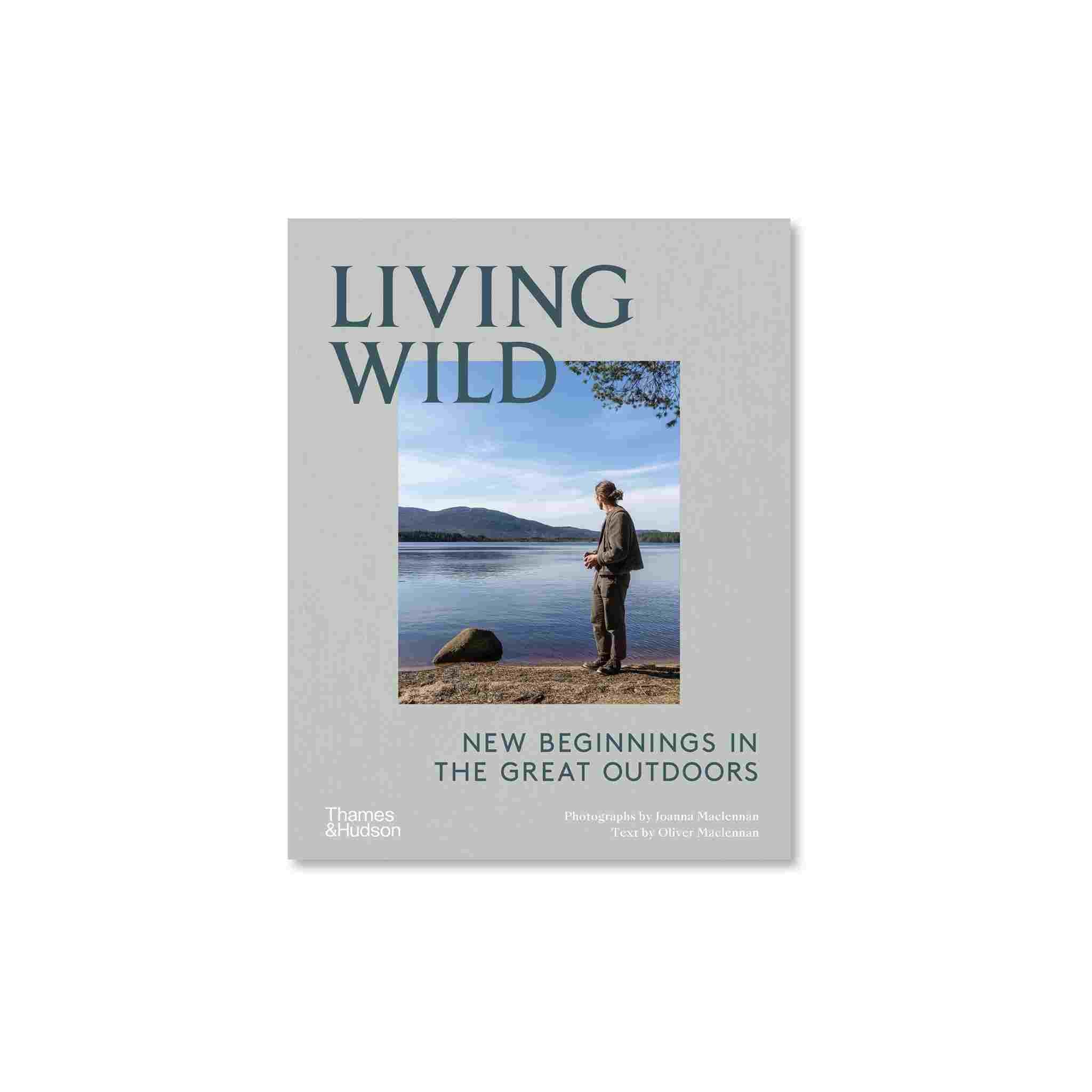 Book titled 'Living Wild' with a cover photo of a person by a lake on a white background