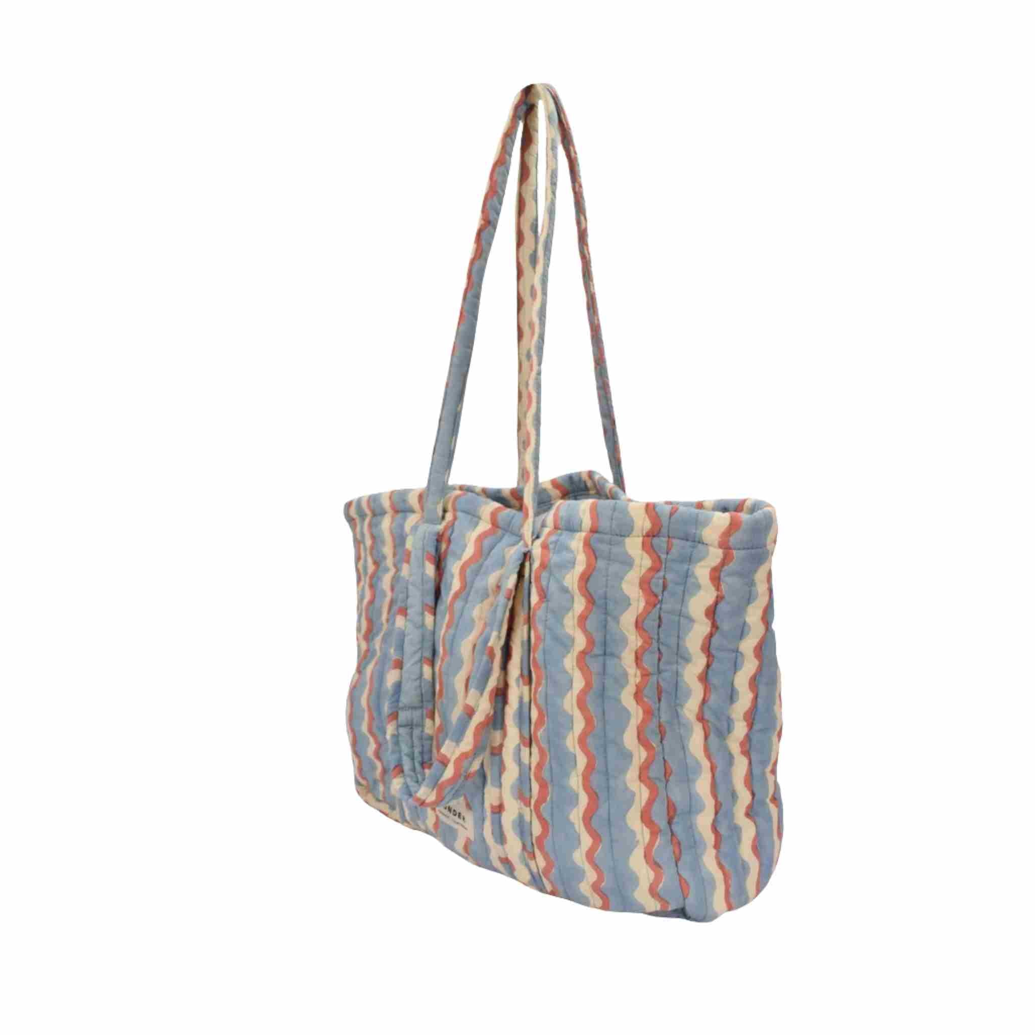 Striped tote bag with a handle on a white background