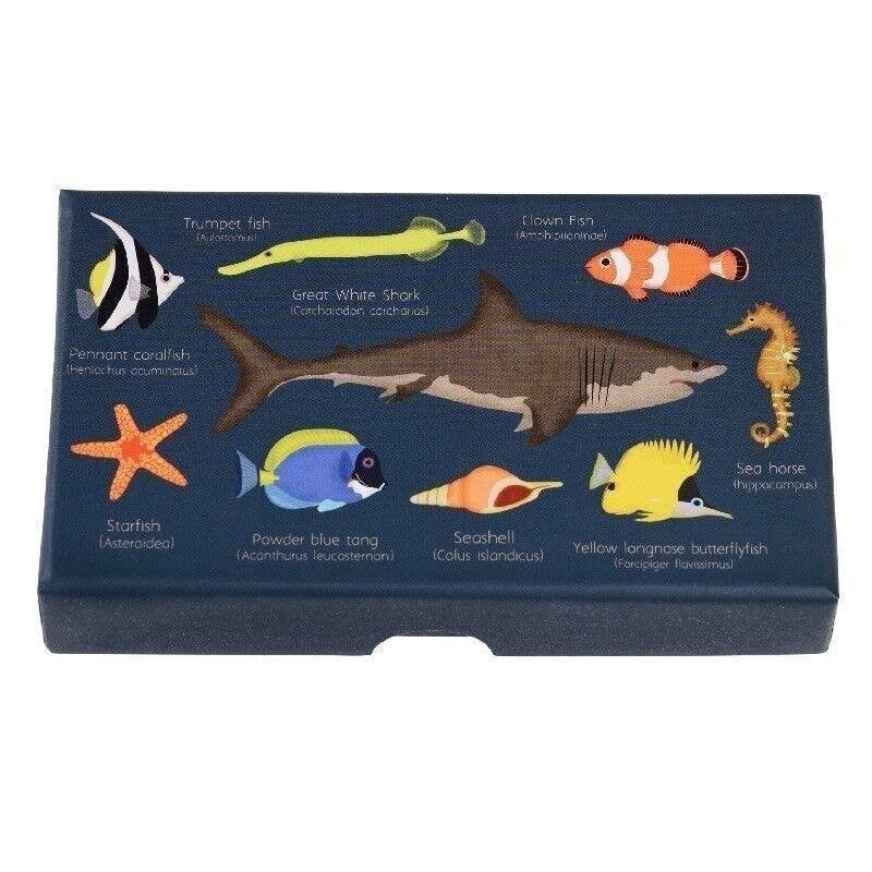 Card with illustrations of various sea creatures on a blue background