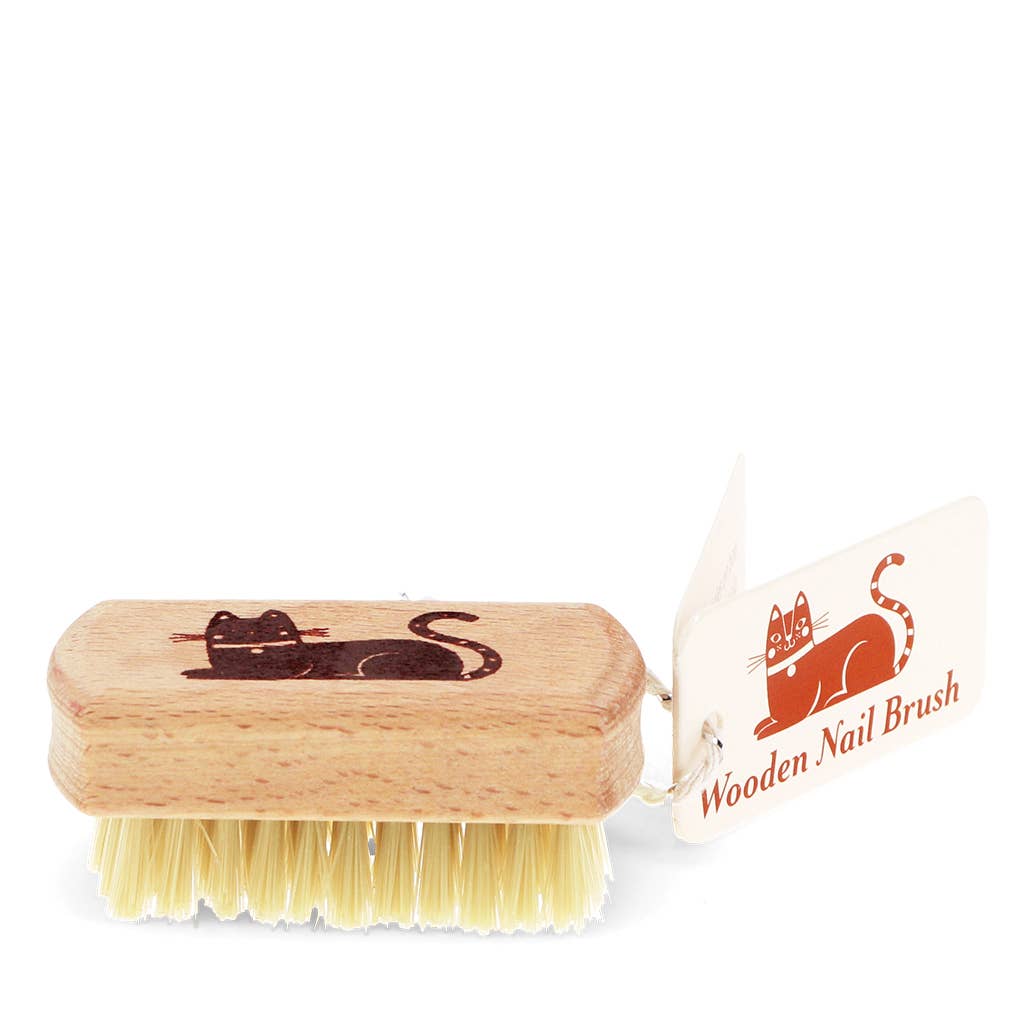 Wooden nail brush with a cat design on a white background