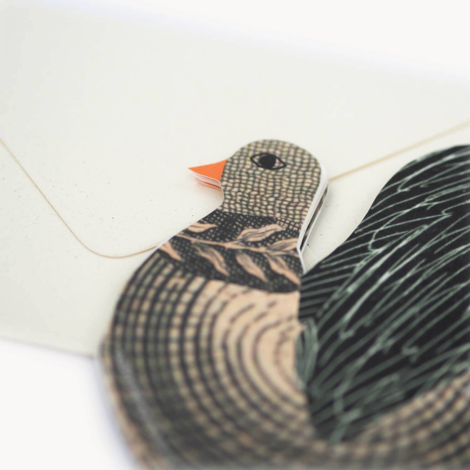 Decorative duck-shaped object with a white background