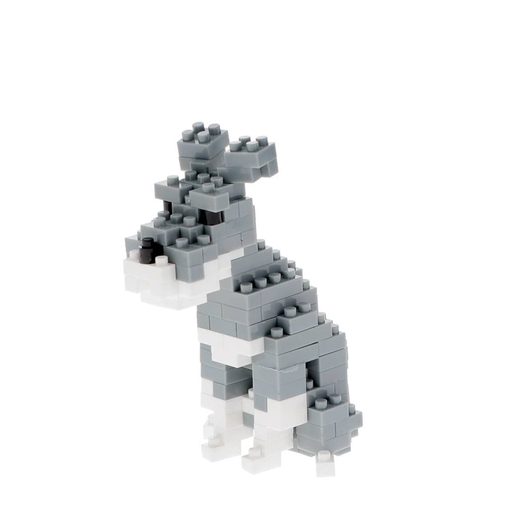 Gray and white dog-shaped building block set on a white background