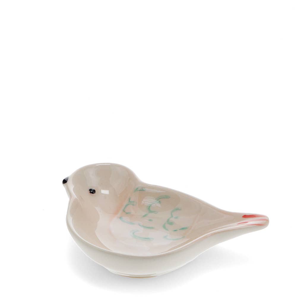 Ceramic bird-shaped dish on a white background