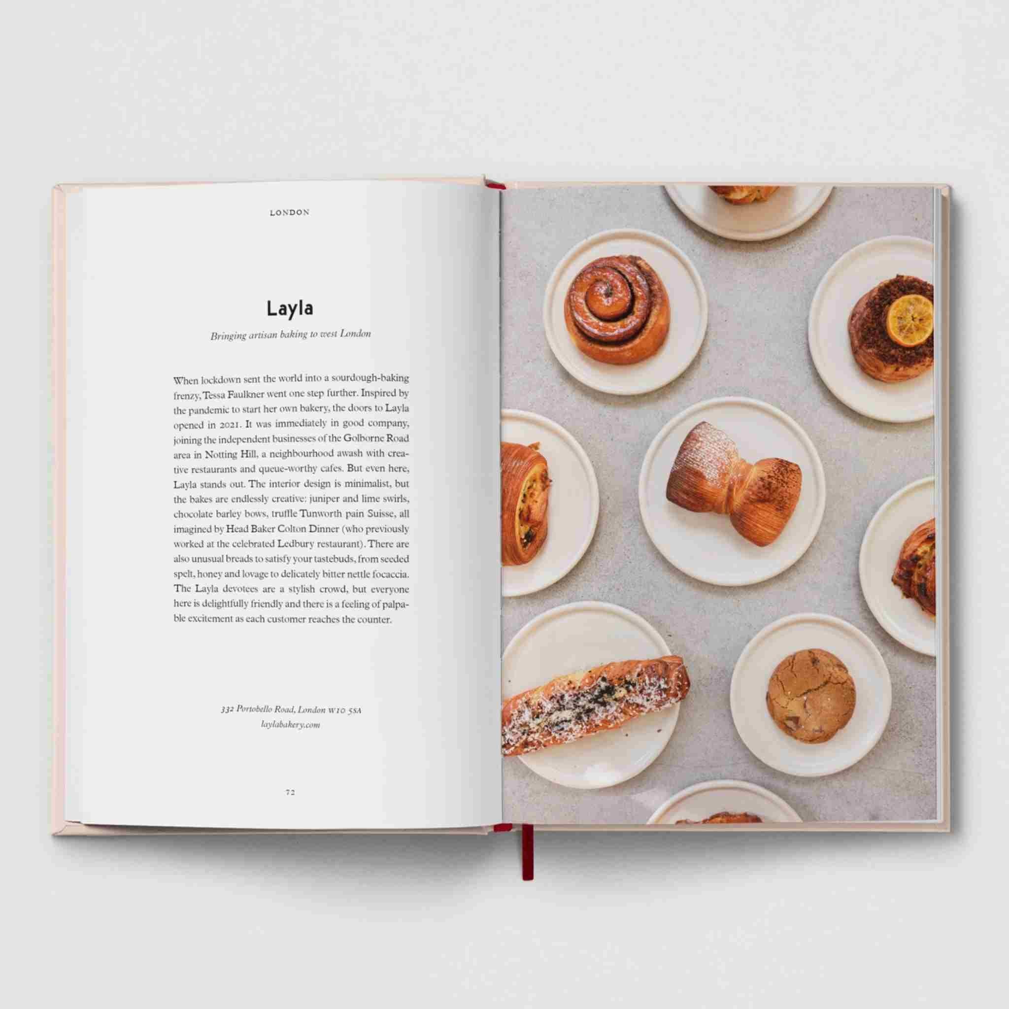Open book showing a page with text and an image of pastries on a light background