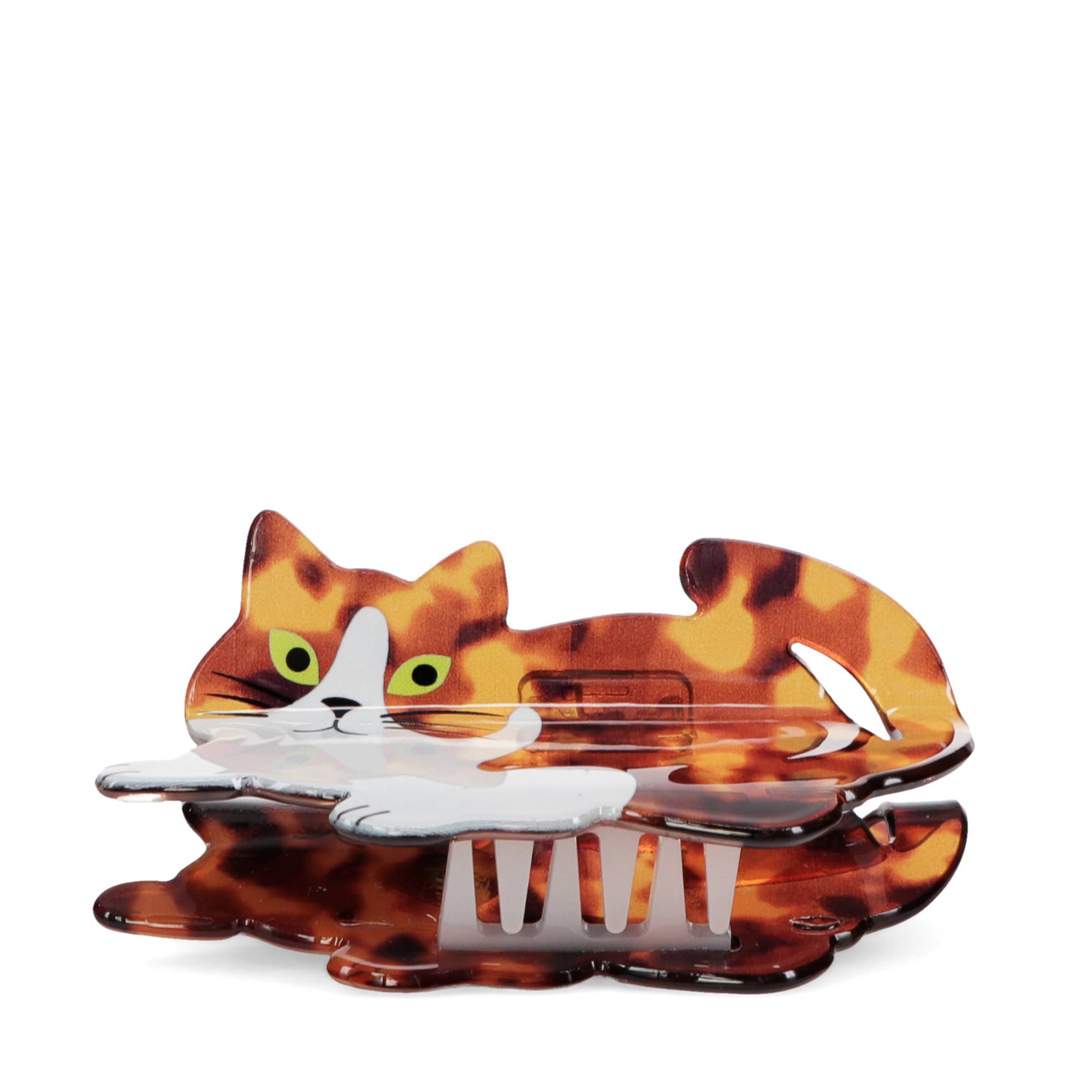 Tortoiseshell cat-shaped hair comb on a white background