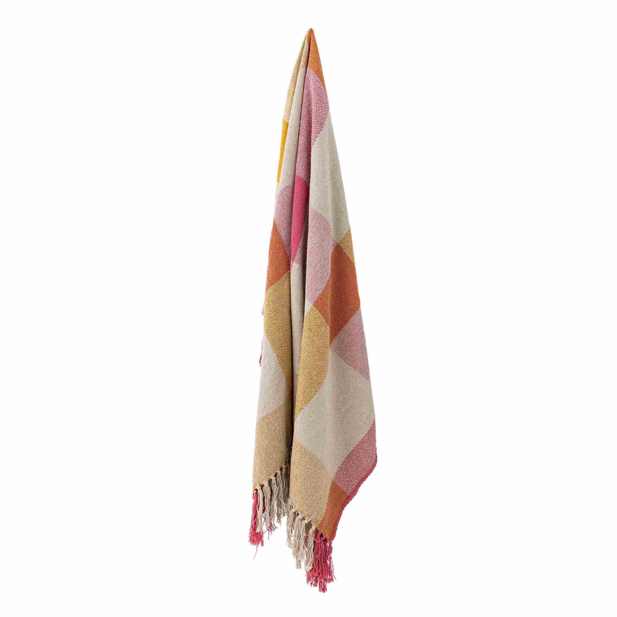 Colorful striped towel with tassels on a white background