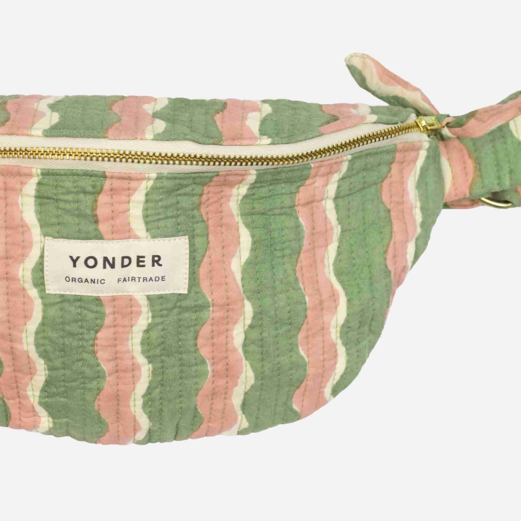 Striped fanny pack with 'Yonder' branding on a white background