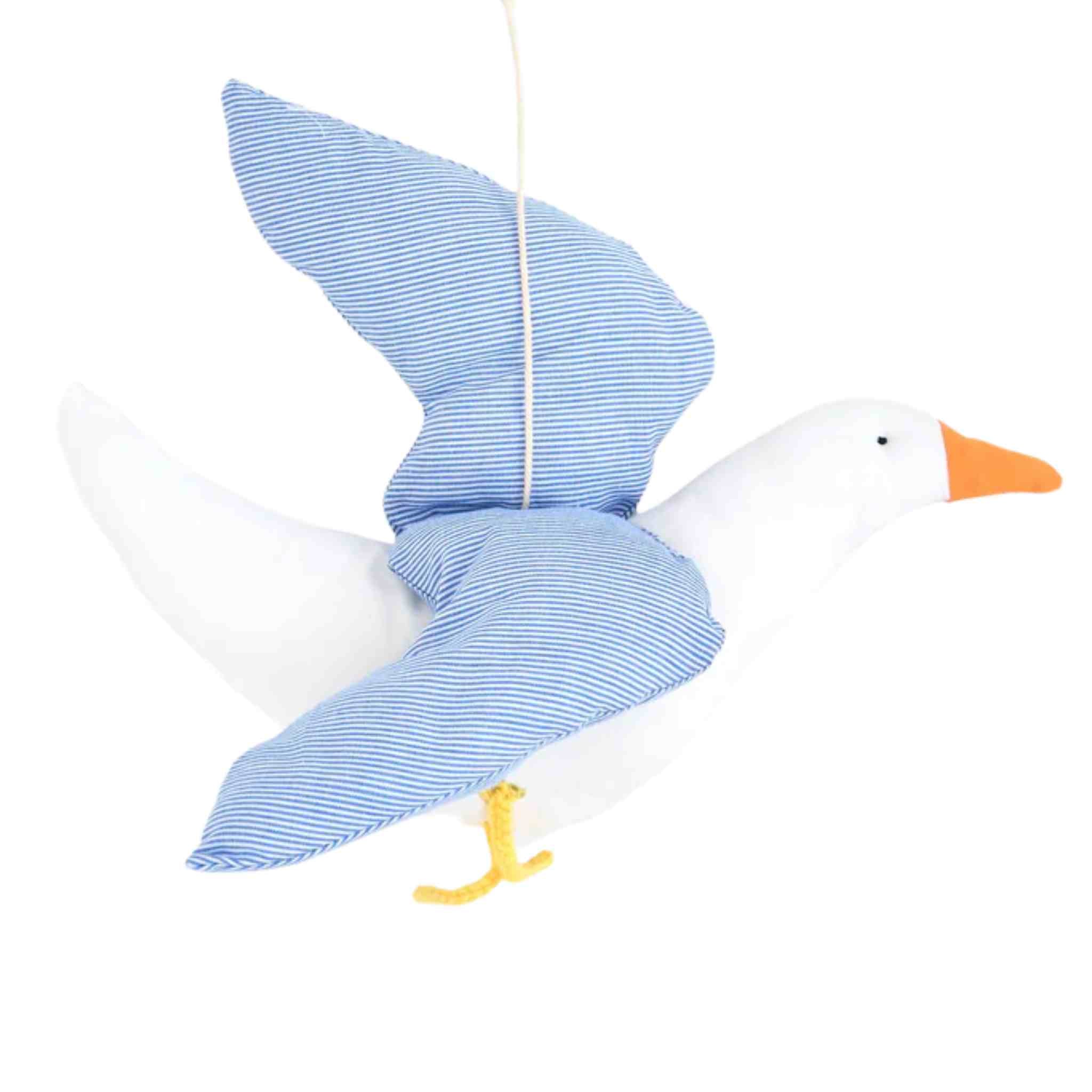 Stuffed toy gull with a blue striped wings on a white background