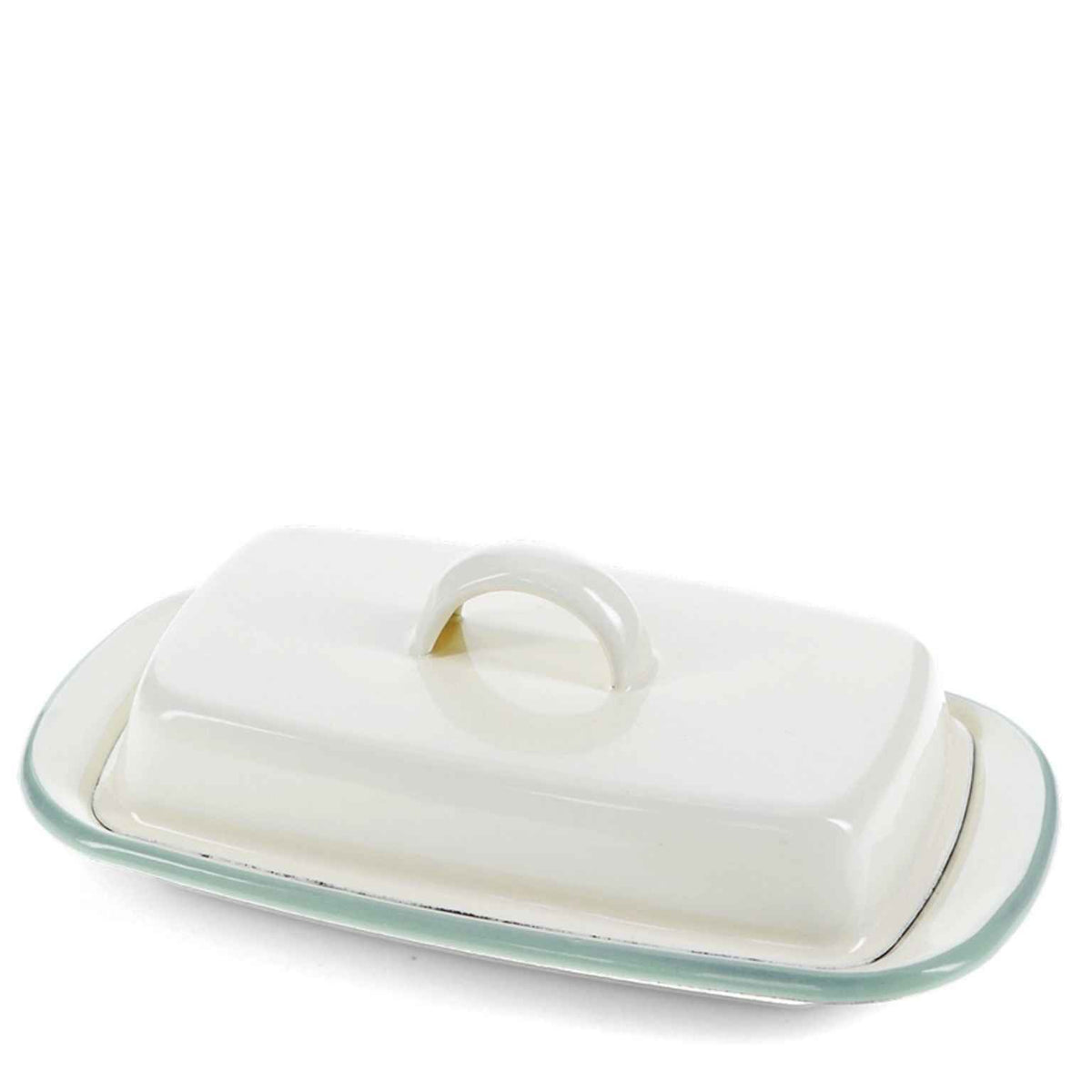 White ceramic butter dish with a lid on a white background
