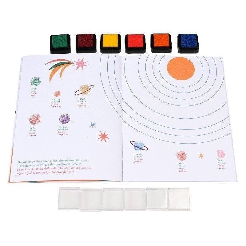 Educational book about the solar system with colored blocks and illustrations.