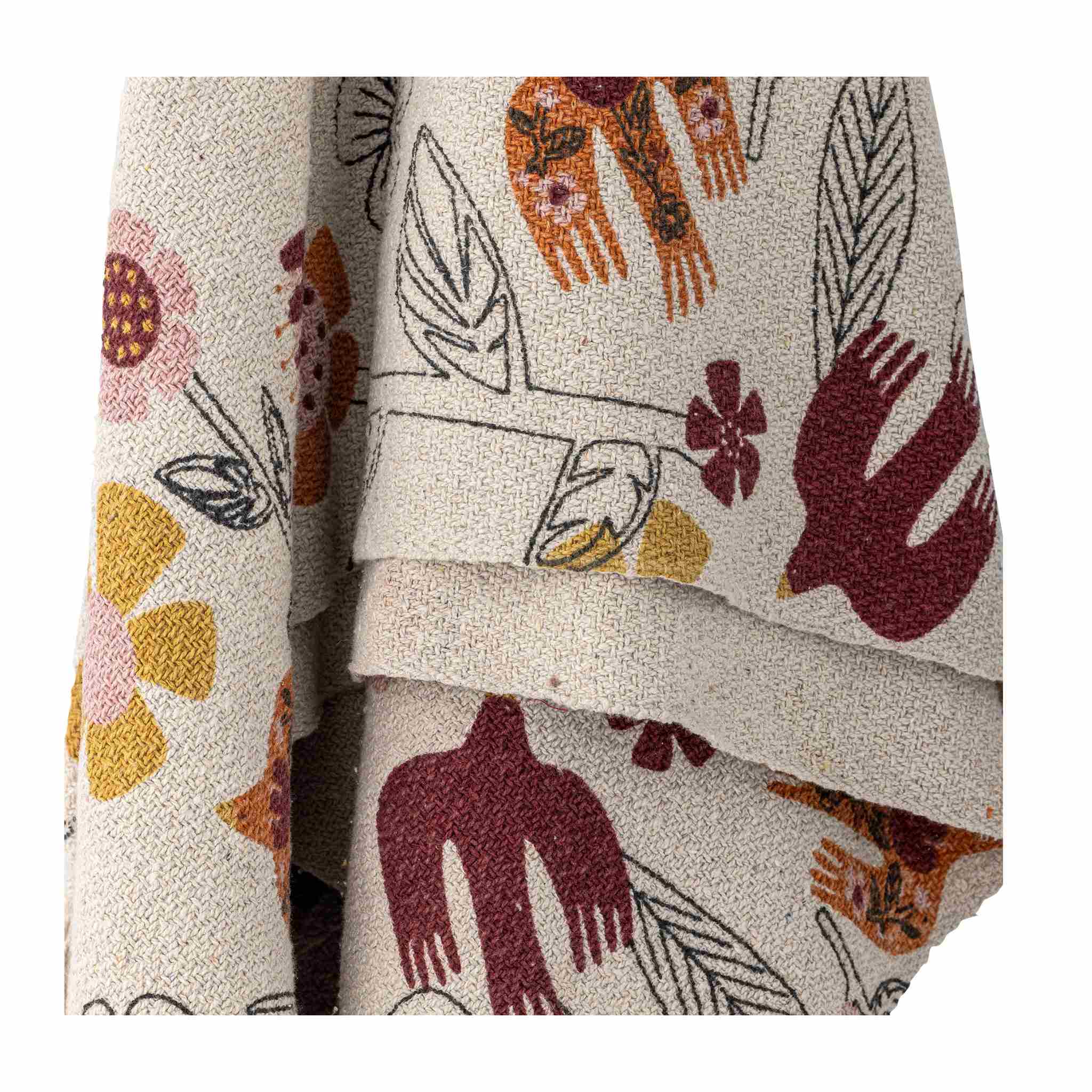 Textile with abstract floral and leaf patterns on a beige background