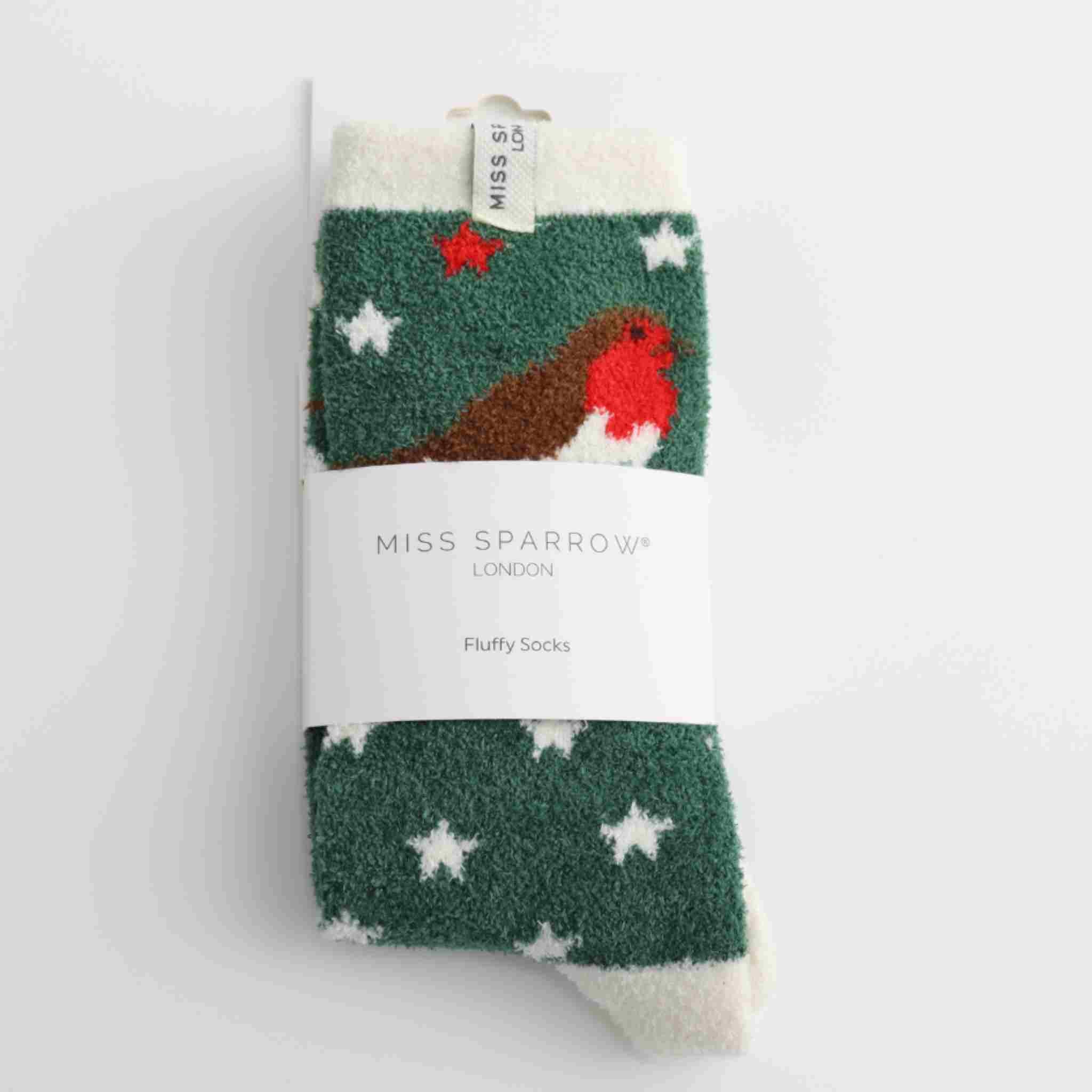Pack of Miss Sparrow London fluffy socks with a robin design on a white background