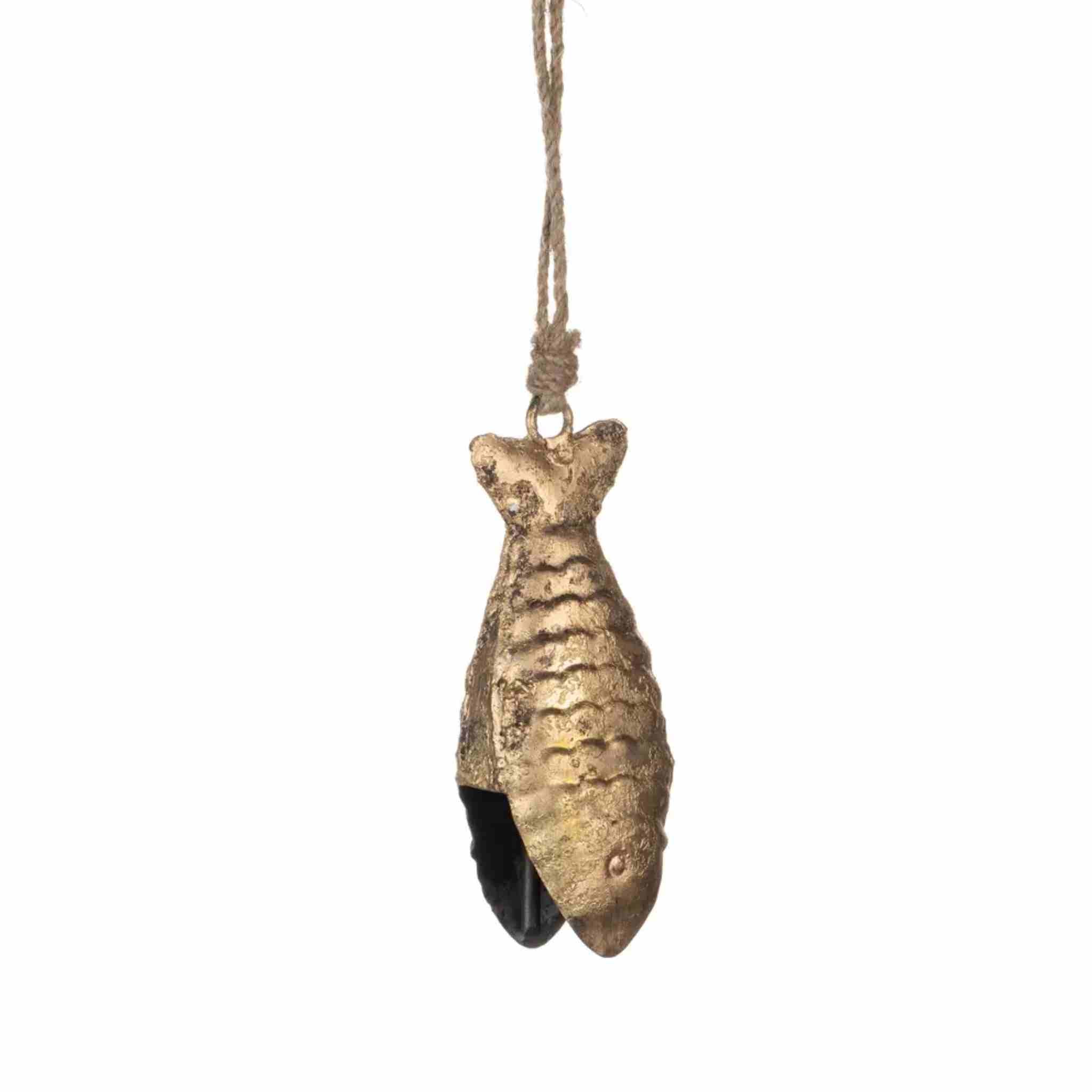 A fish-shaped hanging ornament with a textured metallic gold finish suspended by a natural jute rope background.