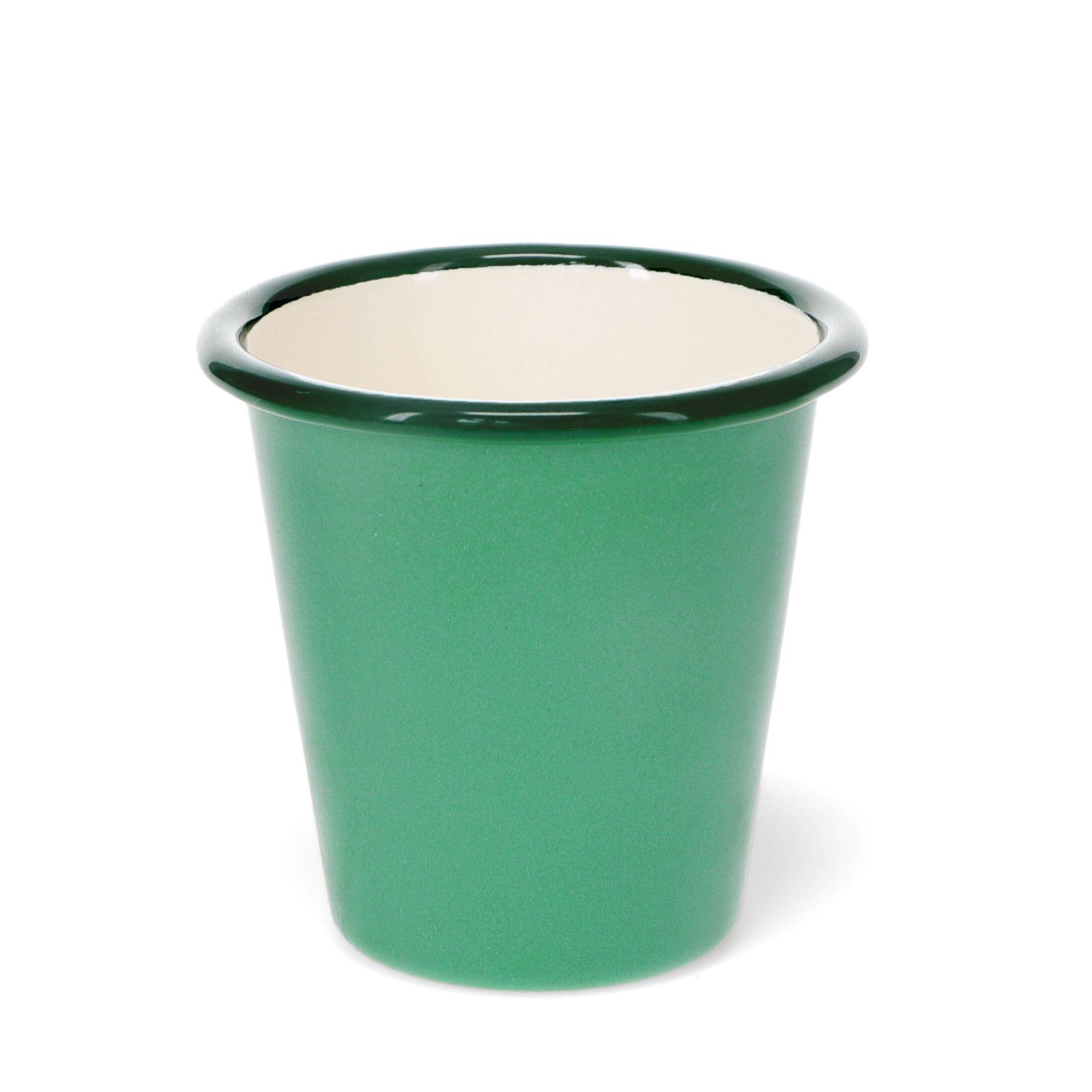 Green enamel mug with white interior on a white background