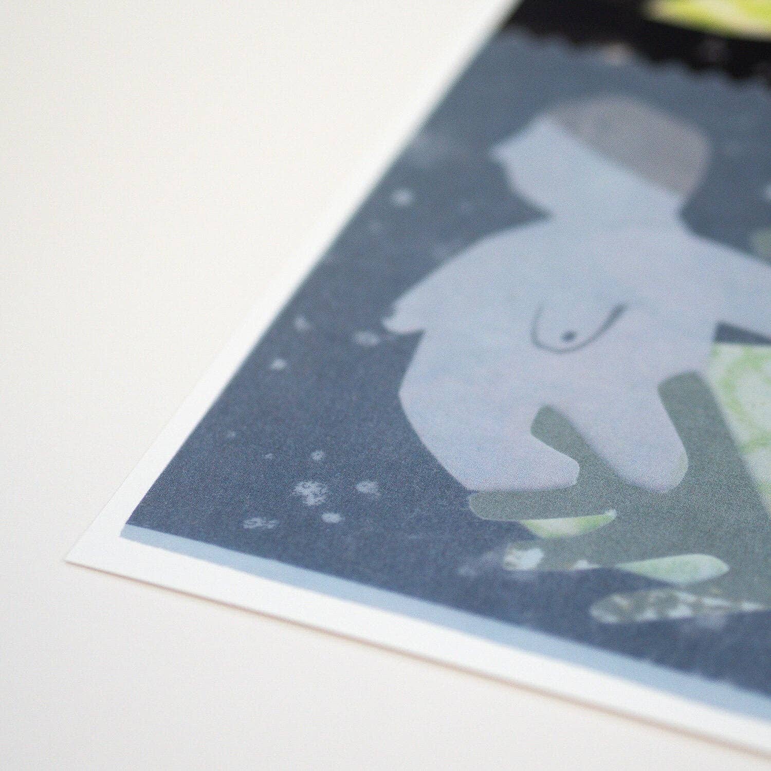 Illustration of a person sitting on a rock with a starry night background