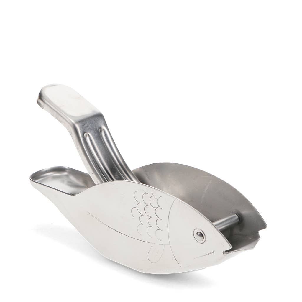 Metallic fish-shaped tool on a white background