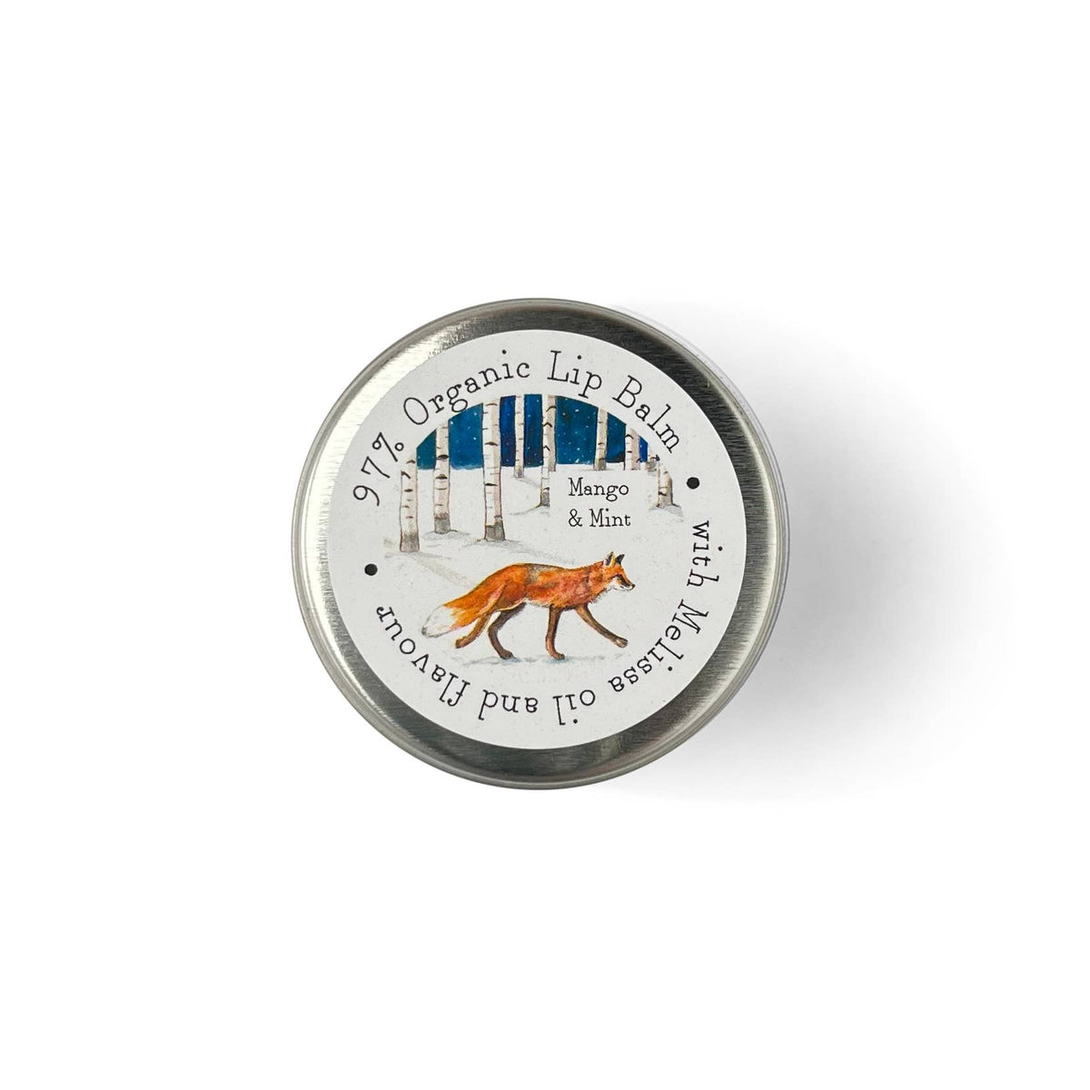 A round tin of organic lip balm with a white illustrated label showing a fox and the text '99% Organic Lip Balm' and 'Mango & Mint'.