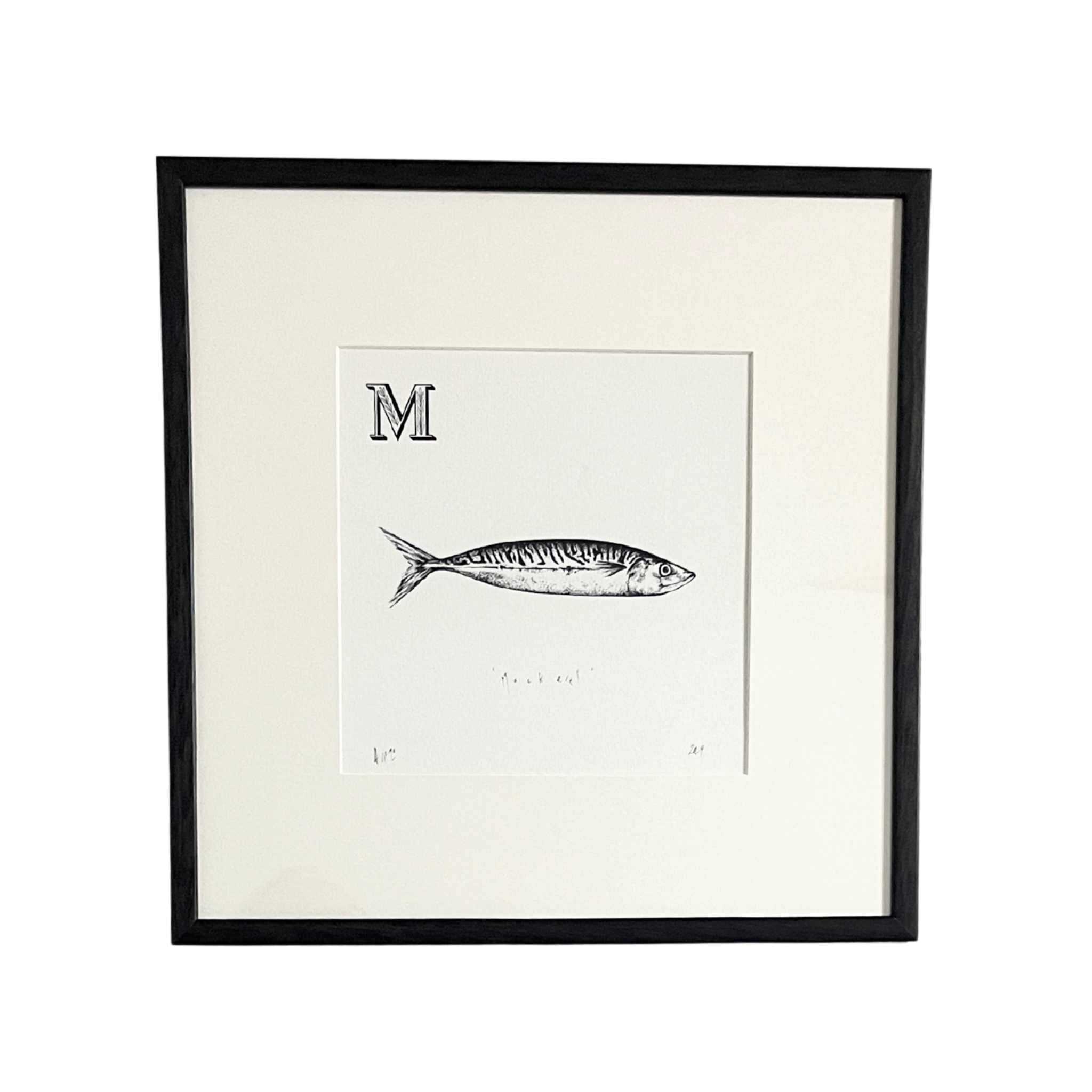 Framed artwork of a fish illustration with letter 'M' on a white background