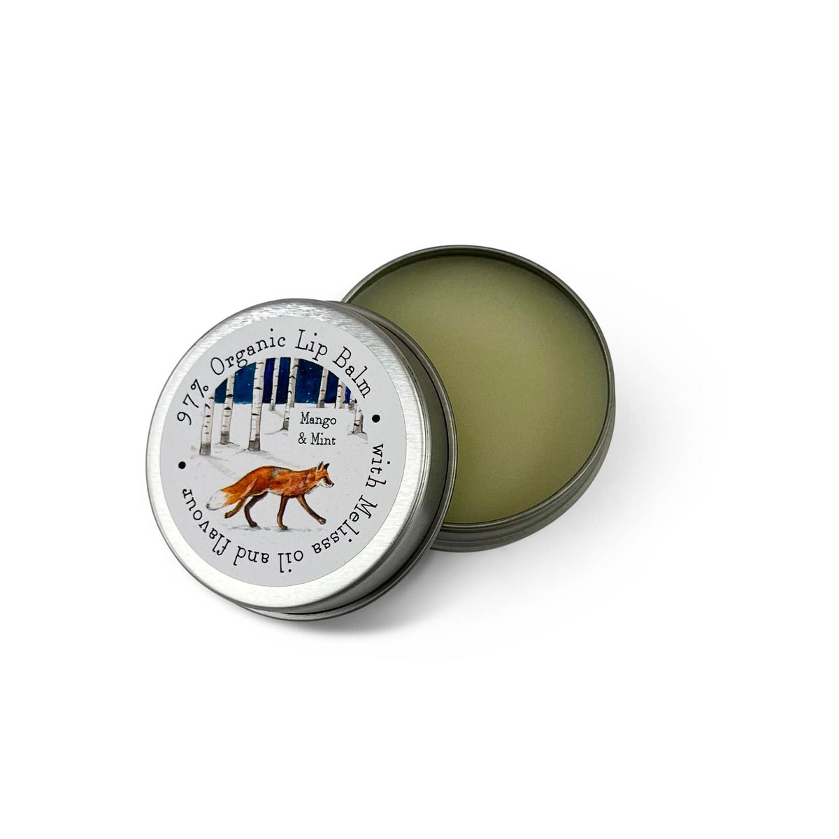 A round metal tin of  Organic Lip Balm, with the lid off to show the light green balm inside. The lid features a white label with an illustration of a fox 