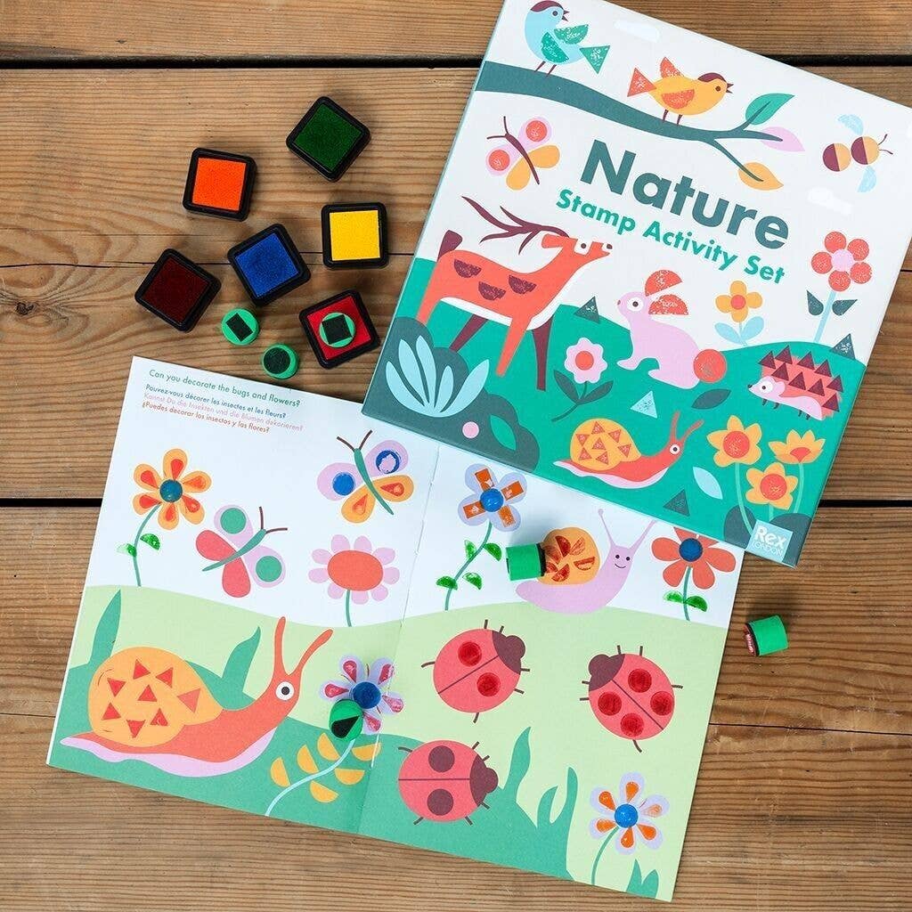 Nature stamp activity set with stamps and cards on a wooden surface