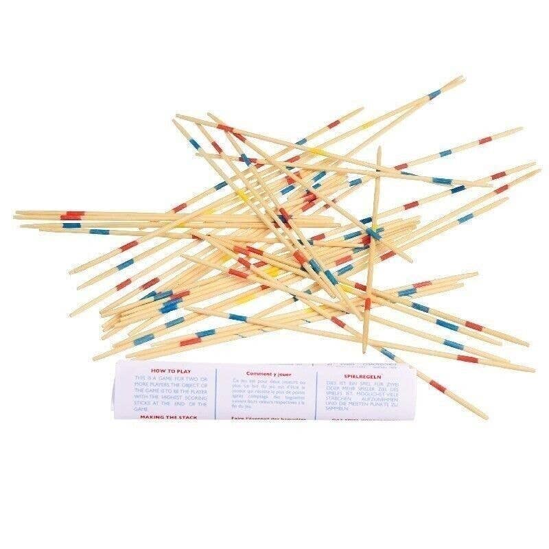 Colorful wooden sticks with a small instruction sheet on a white background