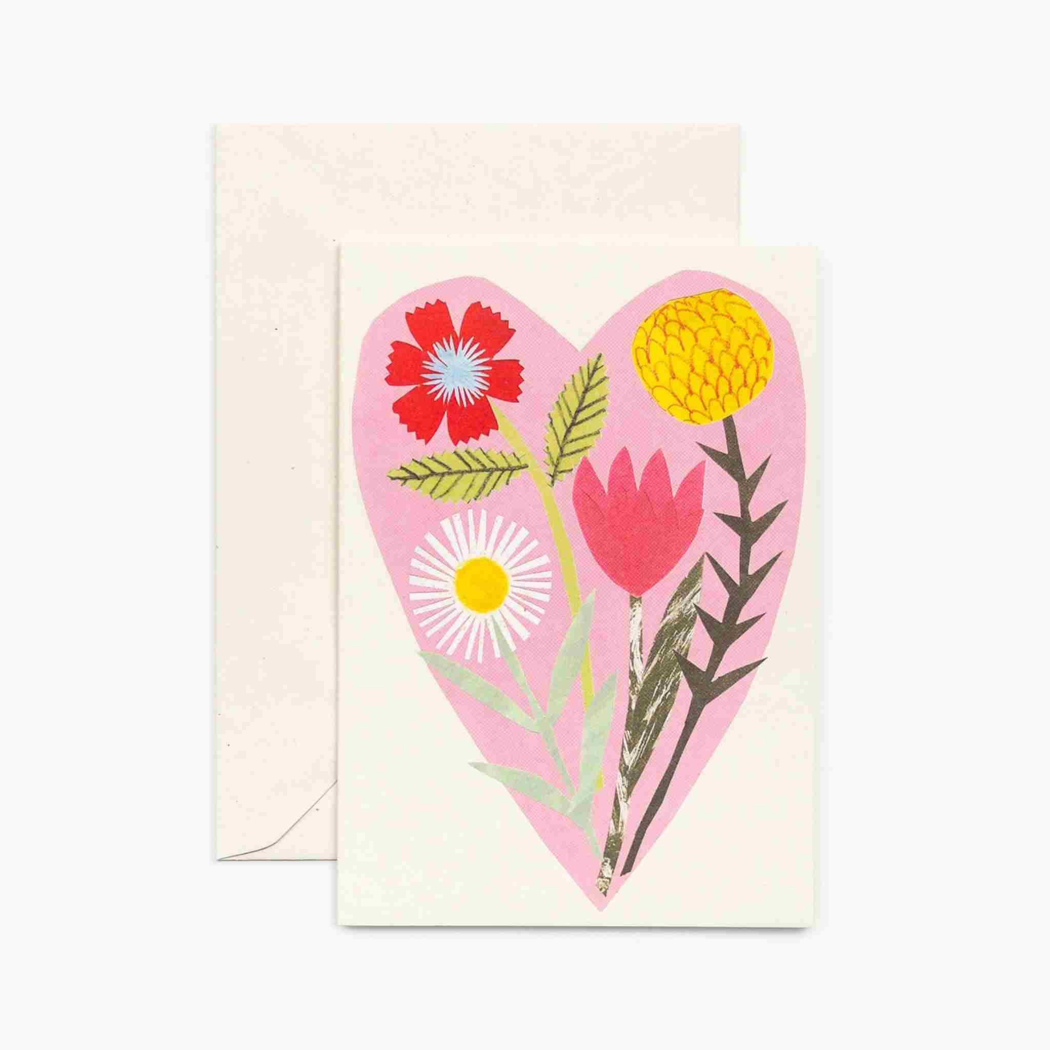 Card with a heart design featuring flowers on a white background