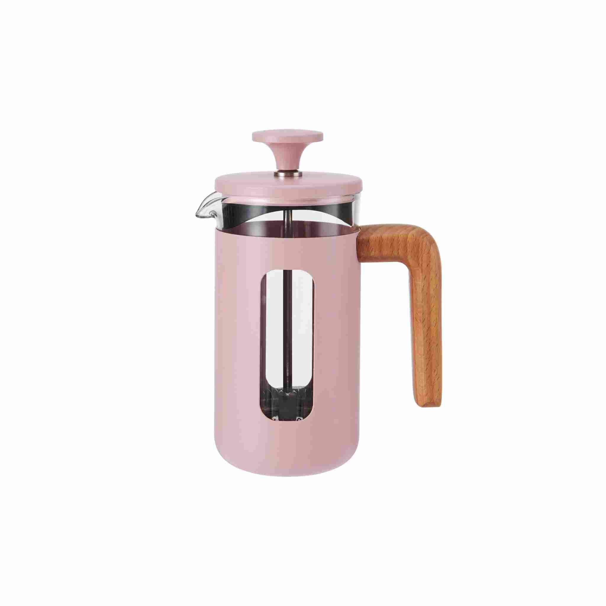 Pink French press coffee maker with wooden handle on a white background