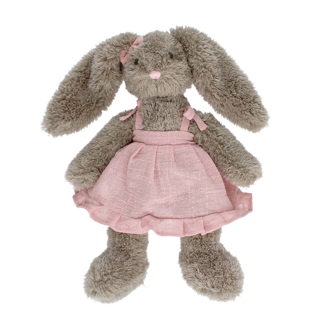 Plush bunny toy with a pink dress on a white background