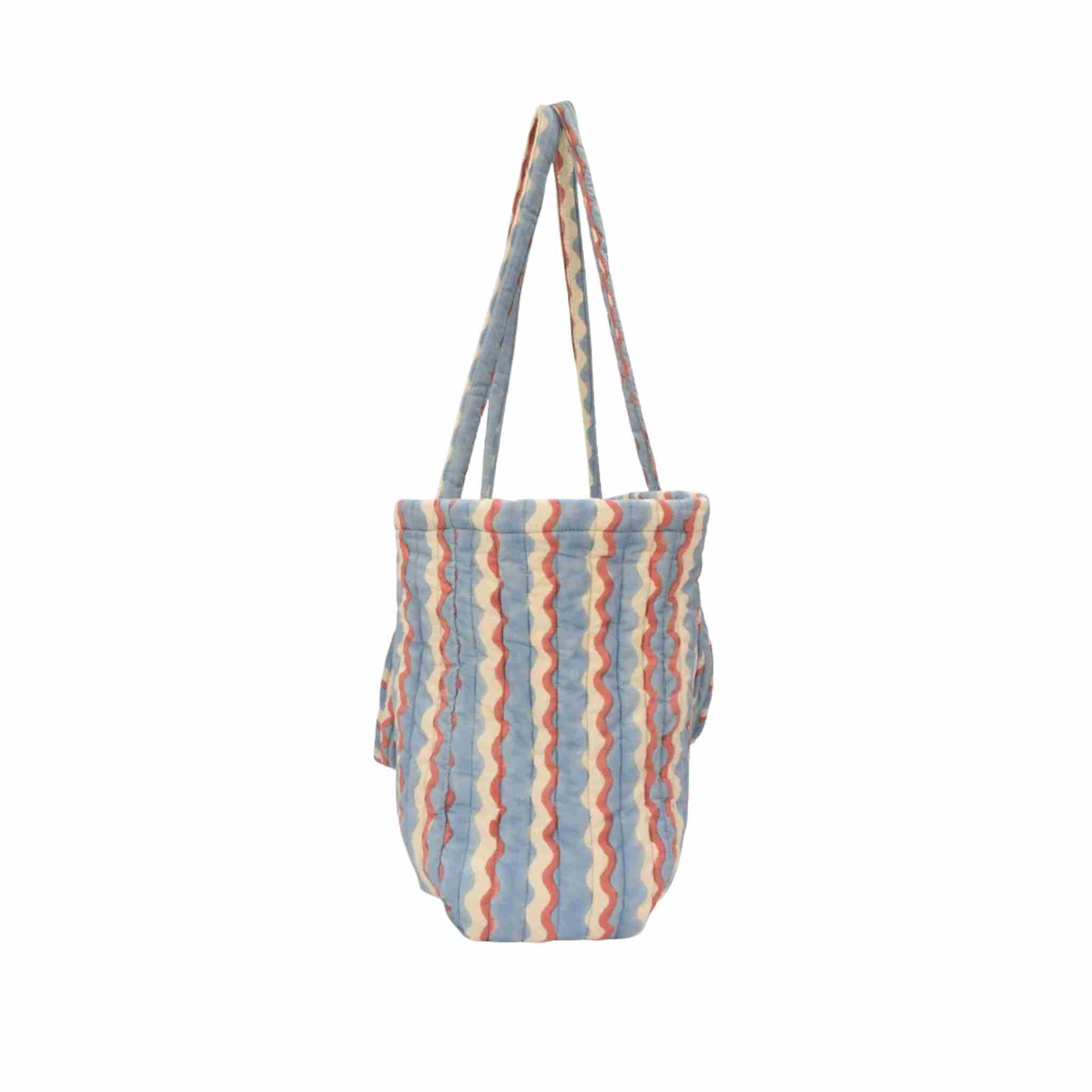 Striped tote bag with a handle on a white background