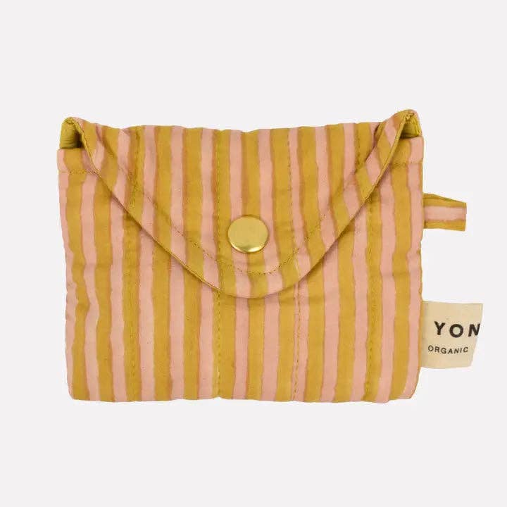 Striped fabric pouch with a gold button and visible brand label on a white background