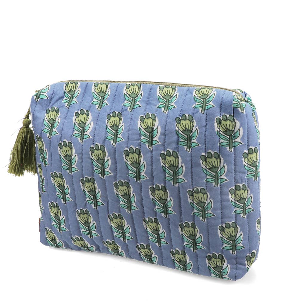 Quilted pouch with floral pattern and tassel on a white background