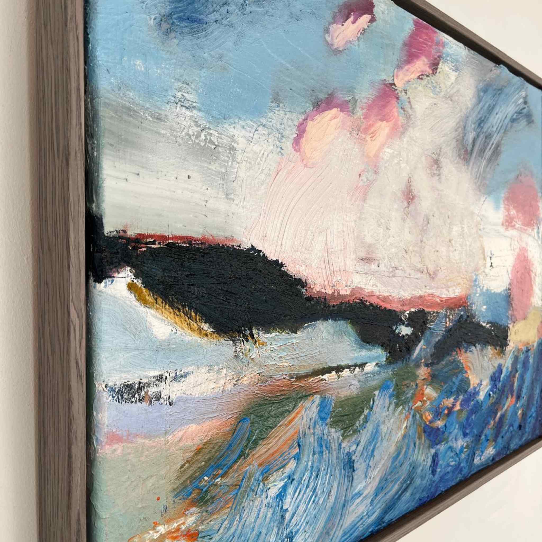 Abstract painting with colorful brush strokes on a white wall