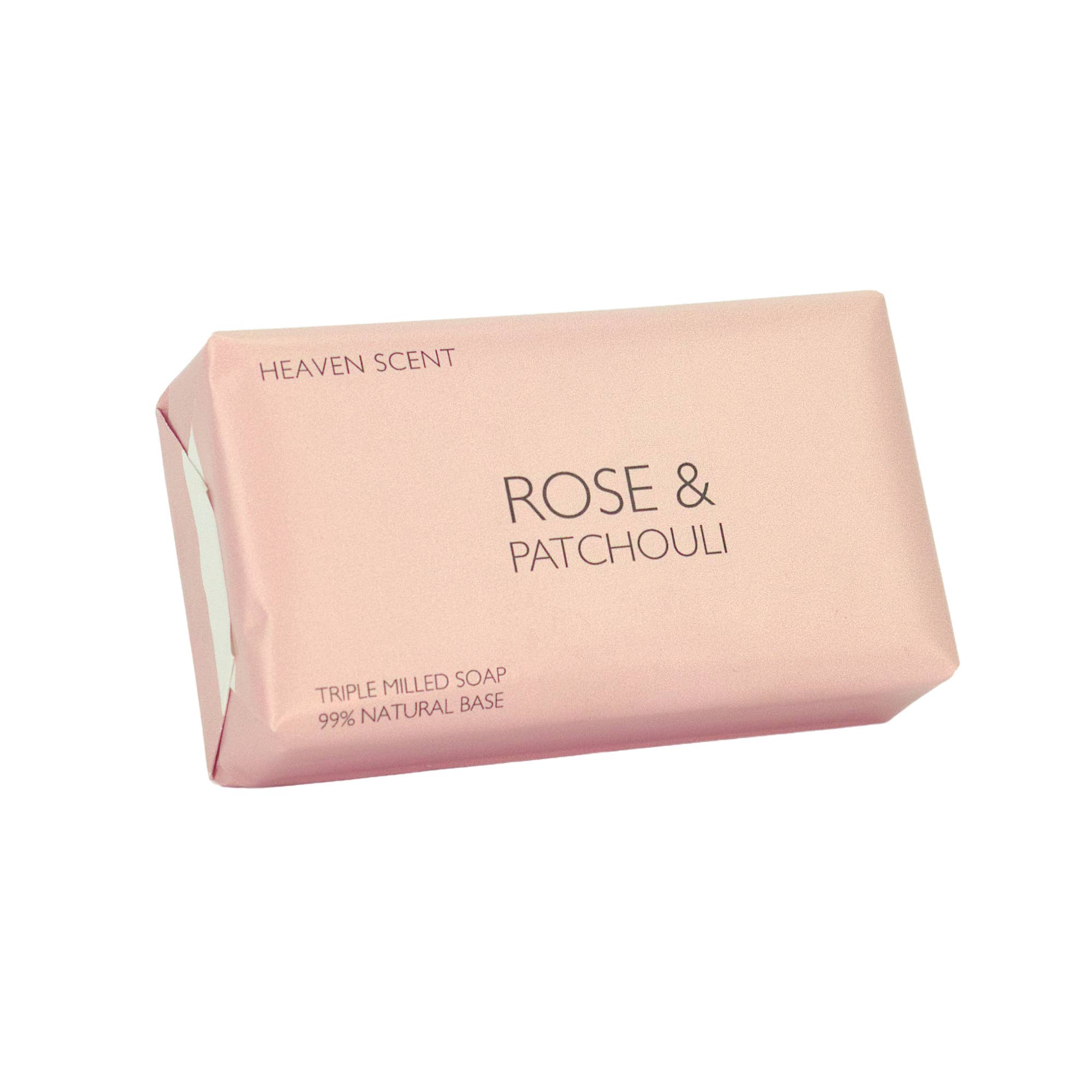 Bar of soap with 'Rose & Patchouli' fragrance on a white background
