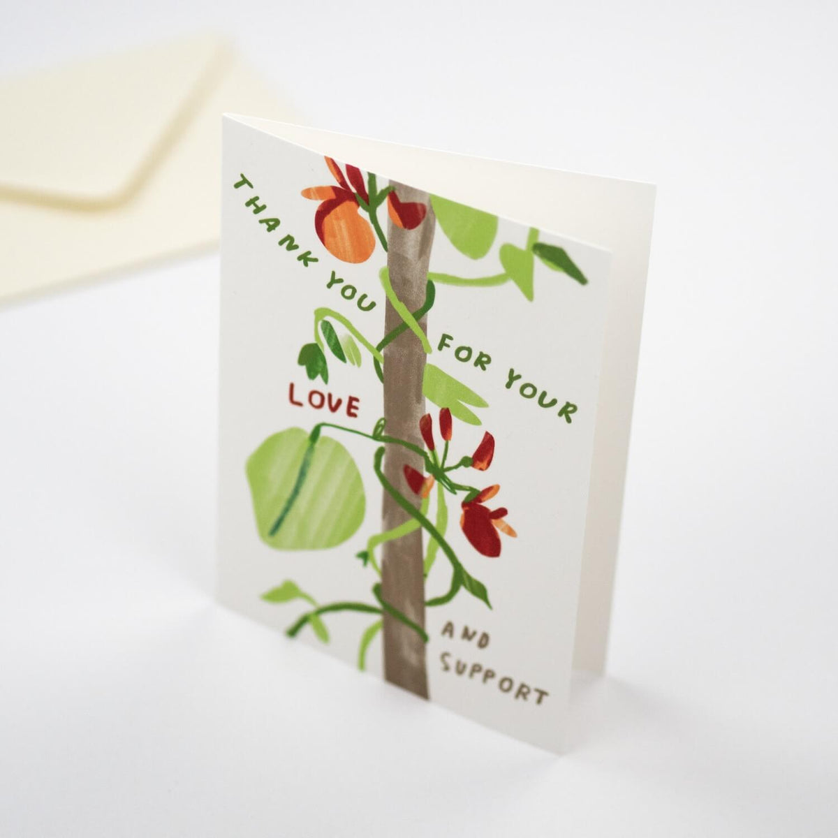 Greeting card with a tree illustration and text on a white background