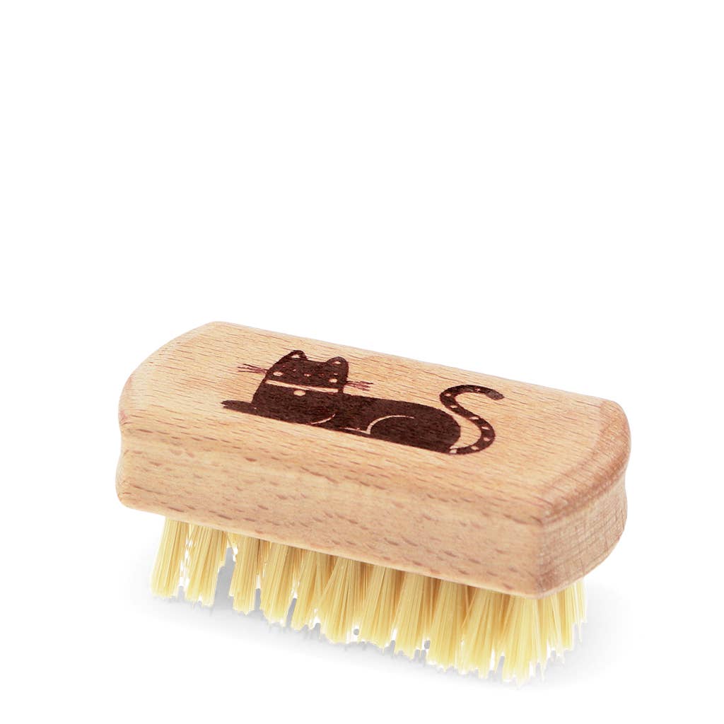 Wooden brush with yellow bristles and a black cat design on a white background