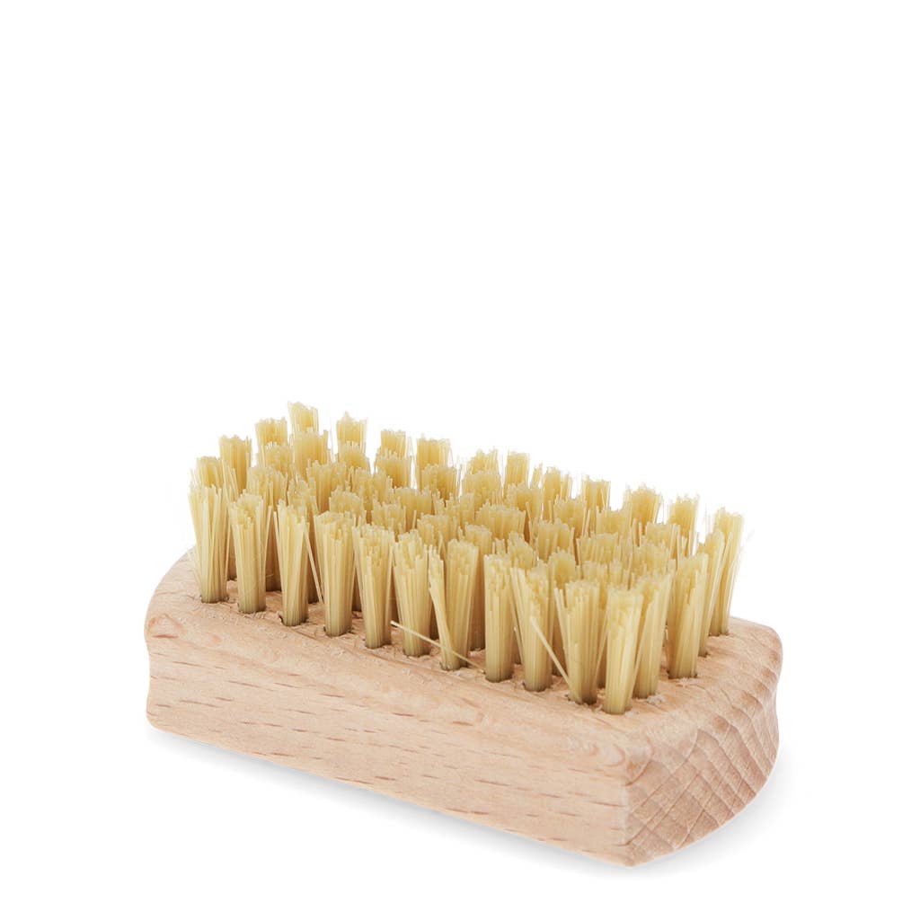 Wooden brush with bristles on a white background