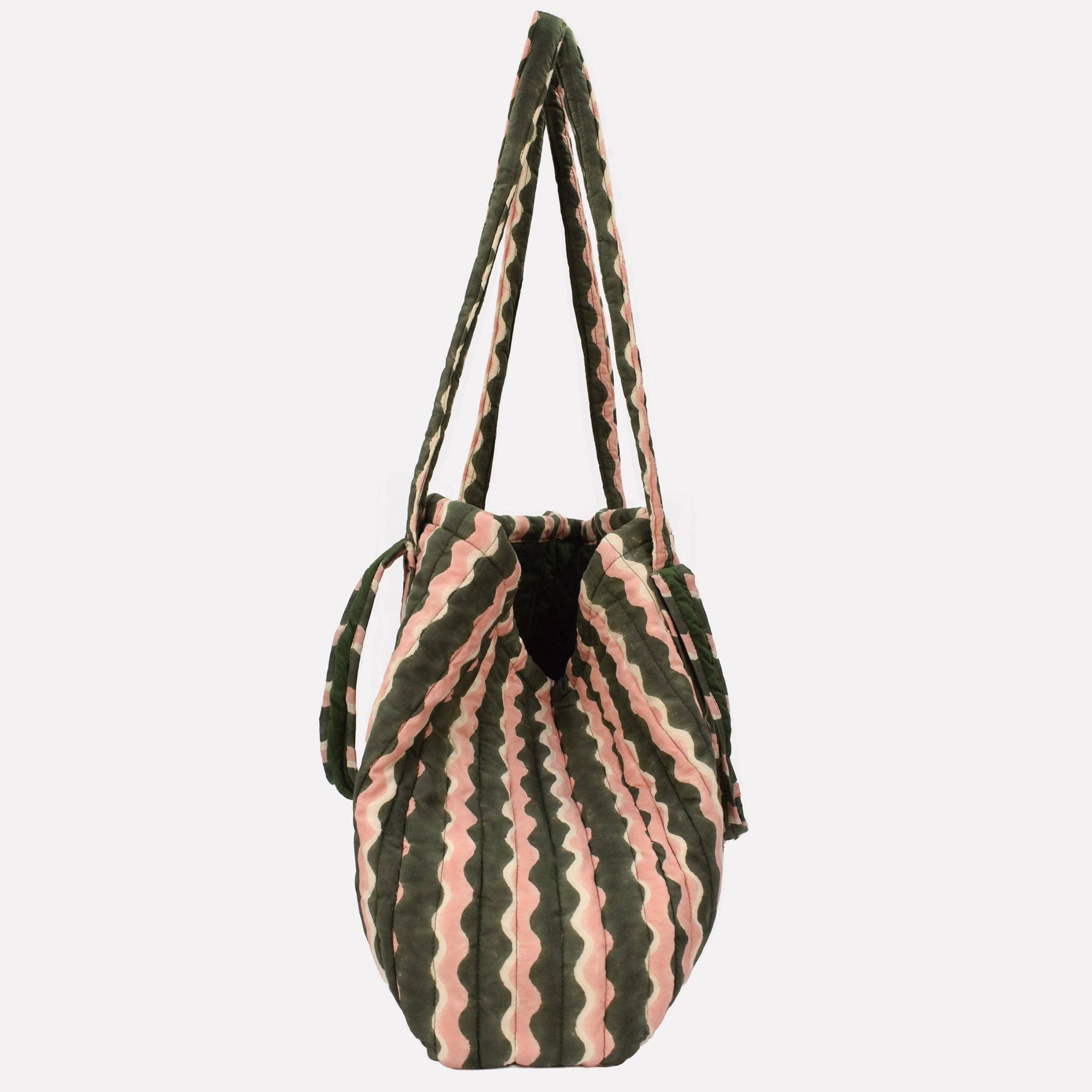Bag with pink and green pattern on a white background