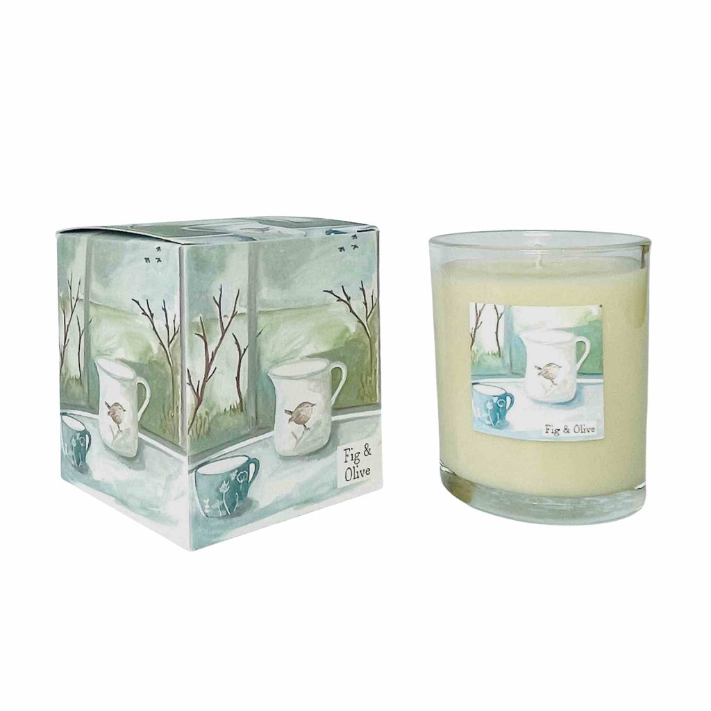 fig and olive scented wax candle in glass container