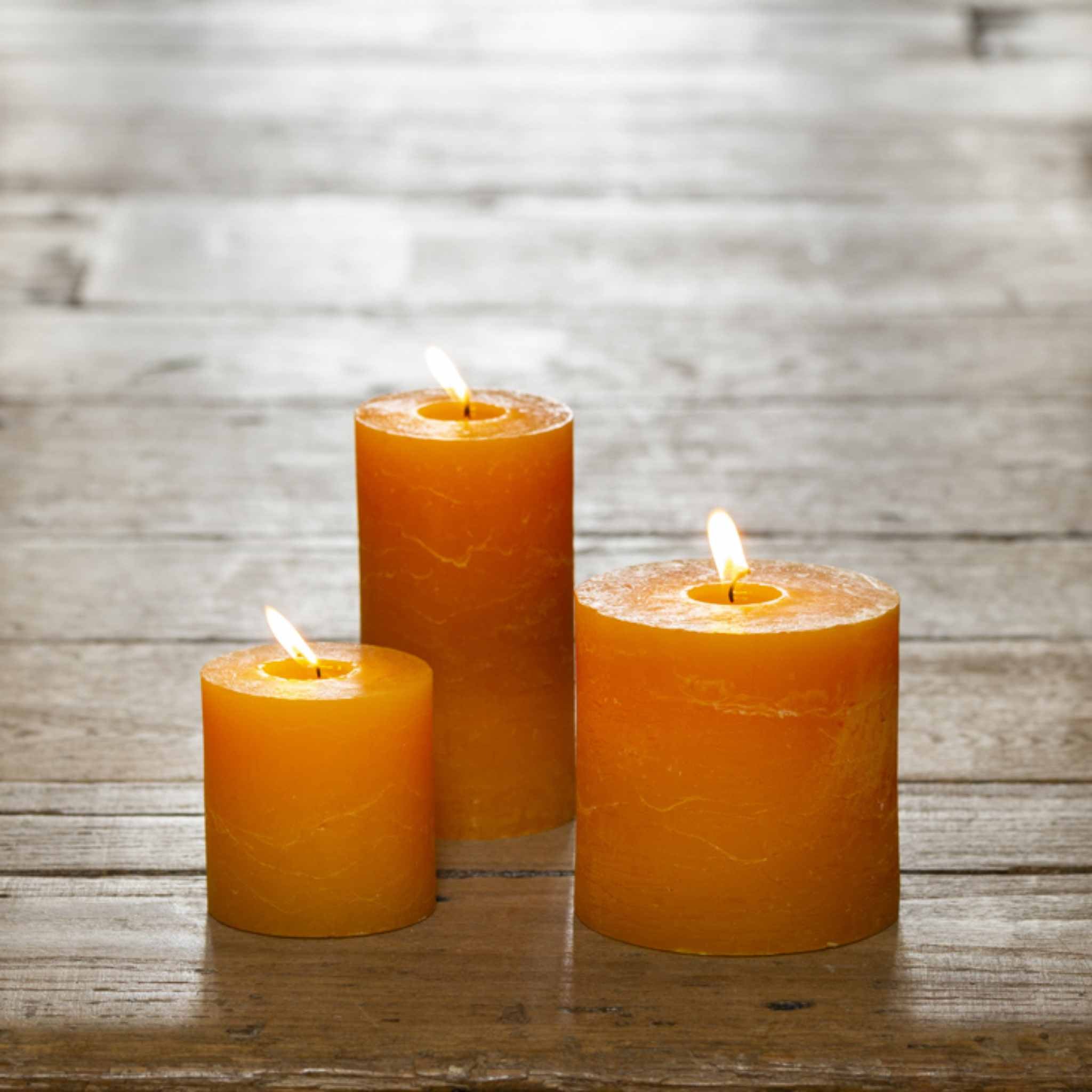 orange ochre pillar candles